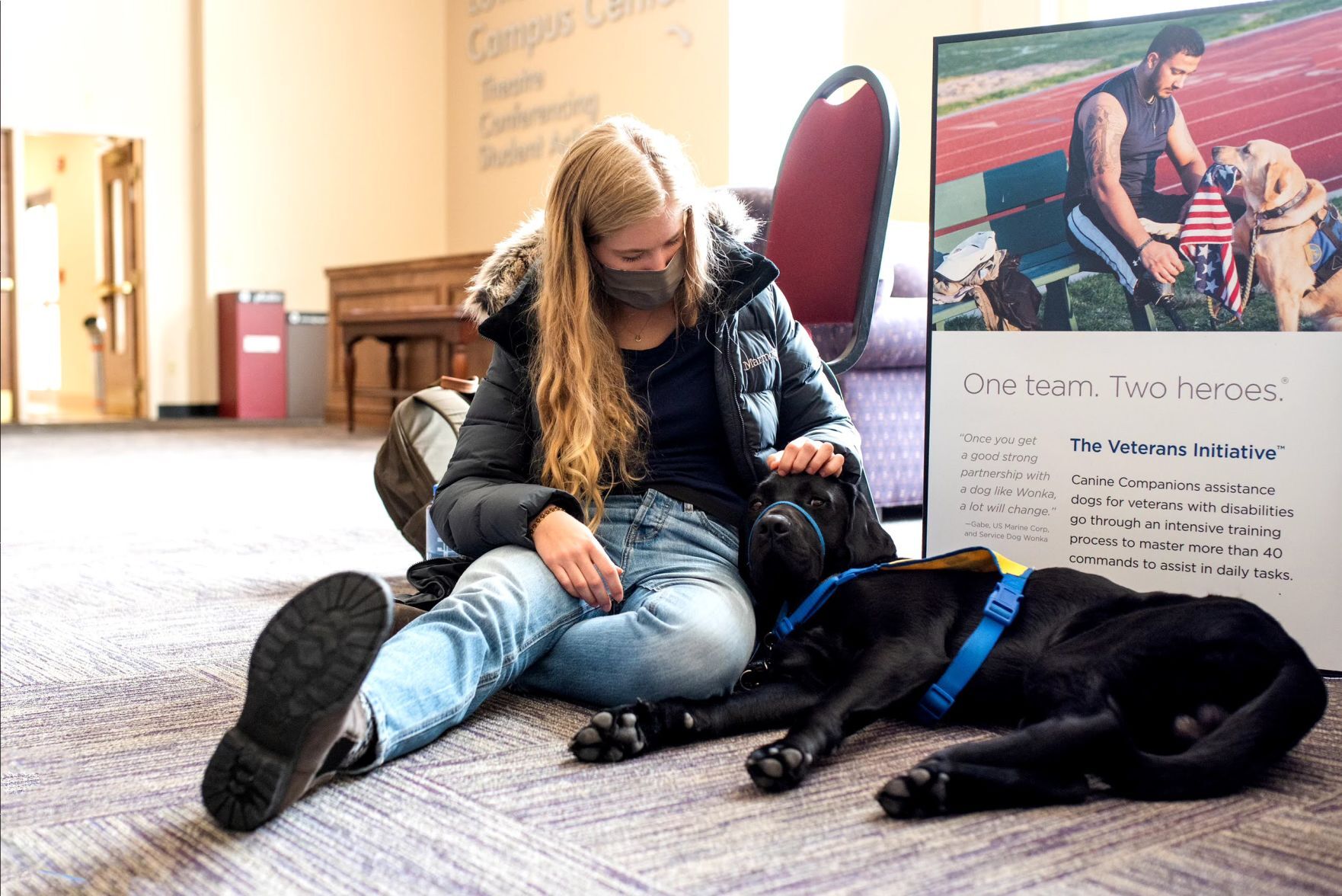 A Collar Scholar club member with Lido a puppy